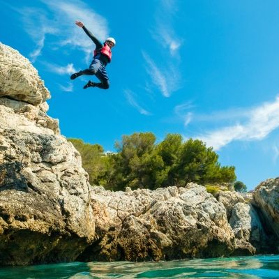 Cliff jumping doing Coasteering